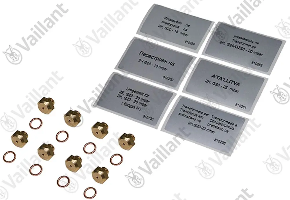 Vaillant Düsenwechselsatz mit mehreren Düsen und O-Ringen auf hellem Hintergrund, beständig für Gasgeräte. Identifizierbare Markierungen und Beschriftungen auf Metalltags.